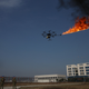 Electric company maintenance workers in Xiangyang, China used a fire-shooting drone to burn garbage from electrical wires (Photo by Wang Hu/VCG)